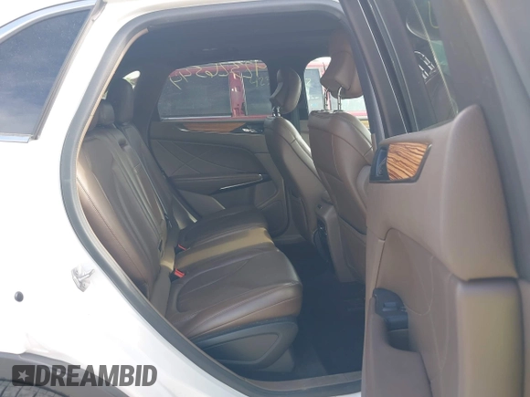 2015 Lincoln MKC z VIN 5LMCJ2A92FUJ06169, wystawiony jako IAAI lot #42326544 z przebiegiem 101 669 mil mil oraz . Historia ofert i sprzedaży dostępna na DreamBid. Obrazek 8.