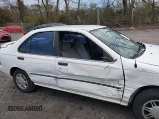 1996 Nissan Sentra XE z VIN 1N4AB41D0TC763104, wystawiony jako IAAI lot #41303640 z przebiegiem 307 682 mil mil oraz . Historia ofert i sprzedaży dostępna na DreamBid. Obrazek 6.
