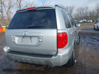 2003 Honda Pilot EX with VIN 2HKYF18633H580612, listed as a IAAI auction lot 41670305 with 216,798 mi miles. Bid and sale history available at carsss.com. Image 4.