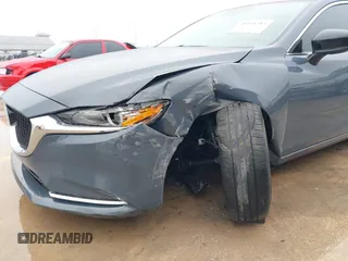 2021 Mazda 6 Carbon Edition with VIN JM1GL1WY0M1600414, listed as a IAAI auction lot 41551393 with 36,780 mi miles and . Bid and sale history available at DreamBid. Image 6.