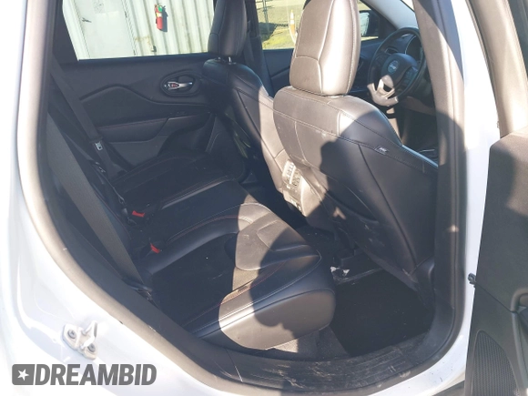 2021 Jeep Cherokee Trailhawk with VIN 1C4PJMBX9MD105888, listed as a IAAI auction lot 42065175 with 55,469 mi miles and . Bid and sale history available at DreamBid. Image 8.