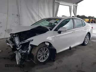 2025 Toyota Camry LE with VIN 4T1DAACK9SU112515, listed as a IAAI auction lot 41932562 with 587 mi miles and . Bid and sale history available at DreamBid. Image 2.