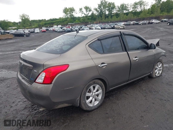 2012 Nissan Versa SV with VIN 3N1CN7AP3CL860116, listed as a IAAI auction lot 42329920 with 105,447 mi miles and . Bid and sale history available at DreamBid. Image 4.
