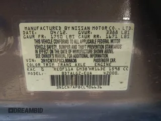 2012 Nissan Versa SV with VIN 3N1CN7AP8CL906636, listed as a IAAI auction lot 42007827 with 111,627 mi miles. Bid and sale history available at carsss.com. Image 9.