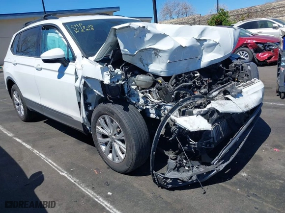2018 Volkswagen Tiguan S with VIN 3VV0B7AXXJM109354, listed as a IAAI auction lot 41841556 with 67,798 mi miles. Bid and sale history available at carsss.com. Image 1.