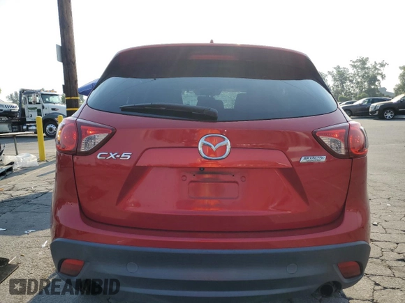 2014 Mazda CX-5 Touring with VIN JM3KE2CY0E0309845, listed as a Copart auction lot 62193734 with 97,878 mi miles and Salvage Title. Bid and sale history available at carsss.com. Image 6.