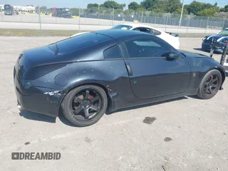 2003 Nissan 350Z Enthusiast with VIN JN1AZ34D83T107831, listed as a IAAI auction lot 41474603 with 135,137 mi miles. Bid and sale history available at carsss.com. Image 6.