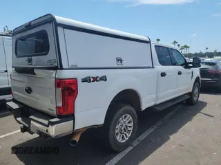 2019 Ford Super Duty F-250 SRW XL with VIN 1FT7W2B6XKEG11413, listed as a IAAI auction lot 42145286 with 125,422 mi miles. Bid and sale history available at carsss.com. Image 1.
