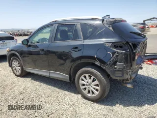 2016 Mazda CX-5 Touring with VIN JM3KE4CY2G0867484, listed as a Copart auction lot 54545435 with 100,664 mi miles and Salvage Title. Bid and sale history available at carsss.com. Image 2.