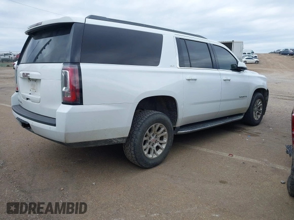 2019 GMC Yukon XL SLT with VIN 1GKS2GKC7KR165419, listed as a IAAI auction lot 40977930 with 167,195 mi miles and . Bid and sale history available at carsss.com. Image 4.