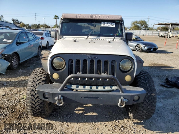 2010 Jeep Wrangler Sport with VIN 1J4AA2D16AL144842, listed as a Copart auction lot 50173535 with 106,000 mi miles and Salvage Title. Bid and sale history available at carsss.com. Image 5.
