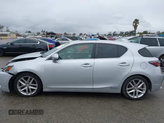2014 Lexus CT 200h Hybrid with VIN JTHKD5BH0E2173721, listed as a IAAI auction lot 41798469 with 124,337 mi miles. Bid and sale history available at carsss.com. Image 14.