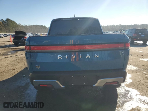 2022 Rivian R1T Launch Edition z VIN 7FCTGAAL7NN000539, wystawiony jako Copart lot #87811245 z przebiegiem Nie podano mil oraz Szkody całkowita. Historia ofert i sprzedaży dostępna na DreamBid. Obrazek 6.