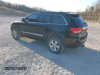 2012 Jeep Grand Cherokee Laredo with VIN 1C4RJFAG3CC246577, listed as a IAAI auction lot 41807693 with 164,574 mi miles. Bid and sale history available at carsss.com. Image 3.