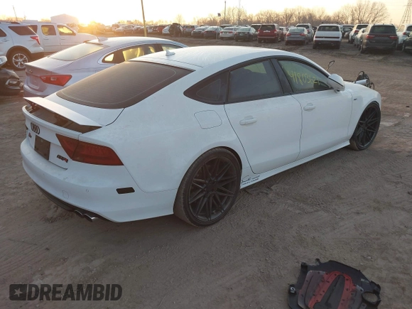 2014 Audi S7 Prestige with VIN WAUW2AFC1EN039425, listed as a IAAI auction lot 41803621 with 73,819 mi miles. Bid and sale history available at carsss.com. Image 4.