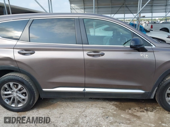 2020 Hyundai Santa Fe SE with VIN 5NMS23AD6LH220012, listed as a IAAI auction lot 42317046 with 141,055 mi miles and . Bid and sale history available at DreamBid. Image 13.