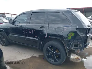 2015 Jeep Grand Cherokee Altitude z VIN 1C4RJFAGXFC659990, wystawiony jako IAAI lot #42331922 z przebiegiem 121 379 mil mil oraz . Historia ofert i sprzedaży dostępna na DreamBid. Obrazek 15.