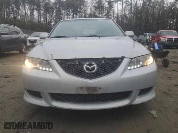 2004 Mazda 6 i with VIN 1YVFP80C045N09474, listed as a Copart auction lot 85890304 with 200,748 mi miles and Salvage Title. Bid and sale history available at DreamBid. Image 5.