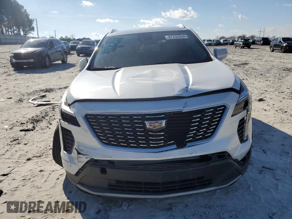 2022 Cadillac XT4 FWD Premium Luxury with VIN 1GYFZCR45NF100049, listed as a Copart auction lot 87232634 with 62,391 mi miles and Salvage title. Bid and sale history available at DreamBid. Image 5.