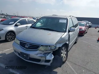 2004 Honda Odyssey EX with VIN 5FNRL18684B143038, listed as a IAAI auction lot 42083469 with 160,317 mi miles and . Bid and sale history available at DreamBid. Image 2.