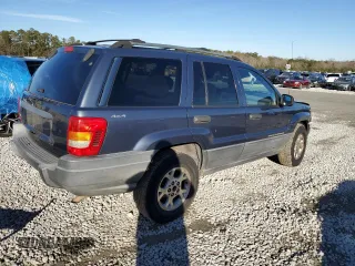 2001 Jeep Grand Cherokee Laredo z VIN 1J4GW48S91C578800, wystawiony jako Copart lot #87934695 z przebiegiem 250 784 mil mil oraz Szkoda całkowita • Salvage title. Historia ofert i sprzedaży dostępna na DreamBid. Obrazek 3.