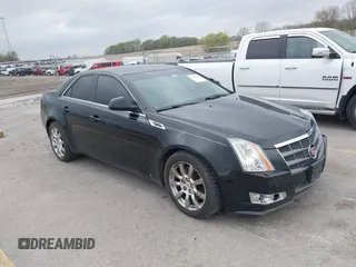2008 Cadillac CTS AWD w/1SA with VIN 1G6DG577080180639, listed as a IAAI auction lot 42128238 with 141,133 mi miles. Bid and sale history available at carsss.com. Image 1.