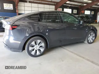 2024 Tesla Model Y Long Range z VIN 7SAYGDEE2RA246928, wystawiony jako Copart lot #60996035 z przebiegiem 19 266 mil mil oraz Szkoda całkowita • Salvage title. Historia ofert i sprzedaży dostępna na DreamBid. Obrazek 3.