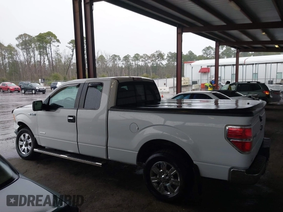 2011 Ford F-150 XL with VIN 1FTFX1CT6BFC10586, listed as a IAAI auction lot 41613825 with 124,854 mi miles. Bid and sale history available at carsss.com. Image 14.