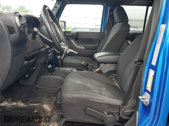 2016 Jeep Wrangler Unlimited Sport with VIN 1C4BJWDG4GL101194, listed as a Copart auction lot 56484055 with 177,303 mi miles and Clean title. Bid and sale history available at DreamBid. Image 7.