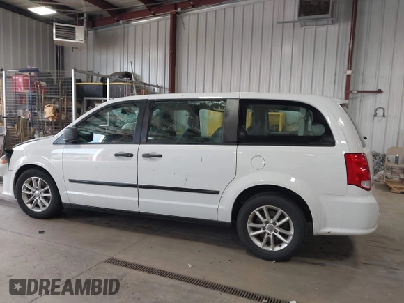 2014 Dodge Grand Caravan American Value with VIN 2C4RDGBG7ER345277, listed as a IAAI auction lot 42061355 with 145,889 mi miles and . Bid and sale history available at DreamBid. Image 14.