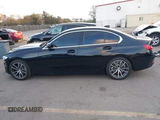 2021 BMW 3 Series 330i with VIN 3MW5R1J07M8B47179, listed as a IAAI auction lot 41450153 with 66,689 mi miles. Bid and sale history available at carsss.com. Image 15.