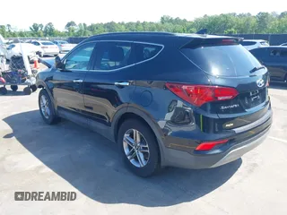 2017 Hyundai Santa Fe 2.4L z VIN 5NMZU3LB4HH024307, wystawiony jako IAAI lot #42147423 z przebiegiem 72 504 mil mil oraz . Historia ofert i sprzedaży dostępna na DreamBid. Obrazek 3.