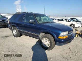 2000 Chevrolet Blazer LS z VIN 1GNCT18W8YK234090, wystawiony jako Copart lot #43063565 z przebiegiem 96 942 mil mil oraz Czysty tytuł • Clean title. Historia ofert i sprzedaży dostępna na DreamBid. Obrazek 4.