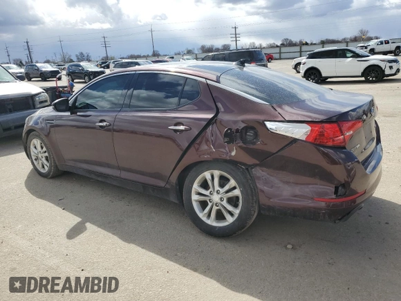 2012 Kia Optima EX with VIN 5XXGN4A74CG037395, listed as a Copart auction lot 49494385 with 124,661 mi miles and Salvage Title. Bid and sale history available at carsss.com. Image 2.
