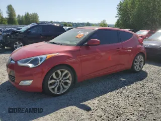 2013 Hyundai Veloster w/Black Int z VIN KMHTC6AD3DU103383, wystawiony jako Copart lot #55693985 z przebiegiem 131 654 mil mil oraz Czysty tytuł • Clean title. Historia ofert i sprzedaży dostępna na DreamBid. Obrazek 1.