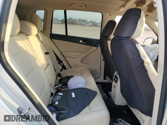2012 Volkswagen Tiguan SEL with VIN WVGAV7AX2CW529098, listed as a Copart auction lot 53349565 with 128,603 mi miles and Salvage Title. Bid and sale history available at DreamBid. Image 11.