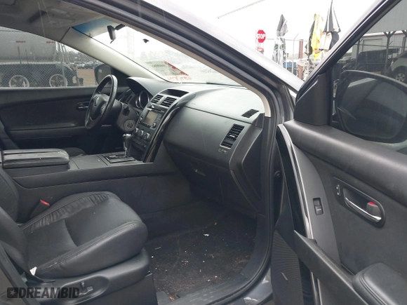 2015 Mazda CX-9 Touring with VIN JM3TB2CA5F0467339, listed as a IAAI auction lot 41840086 with 108,448 mi miles. Bid and sale history available at carsss.com. Image 5.