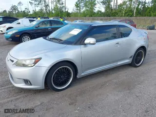 2012 Scion tC with VIN JTKJF5C72C3037233, listed as a IAAI auction lot 41972620 with 229,001 mi miles. Bid and sale history available at carsss.com. Image 2.