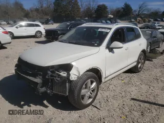 2012 Volkswagen Touareg Sport z VIN WVGFK9BP5CD000233, wystawiony jako Copart lot #46517515 z przebiegiem 198 242 mil mil oraz Szkoda całkowita • Salvage title. Historia ofert i sprzedaży dostępna na DreamBid. Obrazek 1.