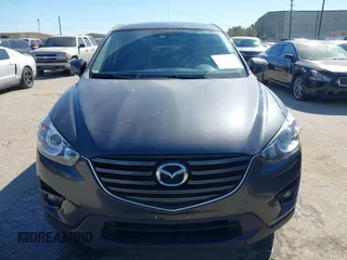 2016 Mazda CX-5 Grand Touring with VIN JM3KE2DYXG0784615, listed as a IAAI auction lot 41846853 with 72,185 mi miles. Bid and sale history available at carsss.com. Image 12.