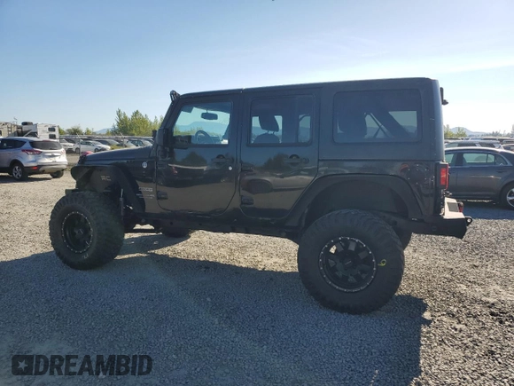 2014 Jeep Wrangler Unlimited Sport with VIN 1C4BJWDG1EL308834, listed as a Copart auction lot 53710065 with 127,612 mi miles and Clean Title. Bid and sale history available at DreamBid. Image 2.