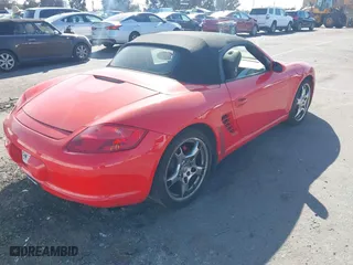 2008 Porsche Boxster S with VIN WP0CB29858U730258, listed as a IAAI auction lot 41718569 with 209,434 mi miles. Bid and sale history available at carsss.com. Image 4.