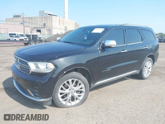 2014 Dodge Durango Citadel with VIN 1C4RDJEG0EC537335, listed as a IAAI auction lot 42660446 with 176,791 mi miles and . Bid and sale history available at DreamBid. Image 2.