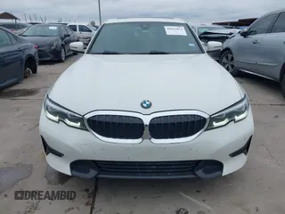 2020 BMW 3 Series 330i with VIN WBA5R1C06LFH40375, listed as a IAAI auction lot 41023872 with 98,325 mi miles and . Bid and sale history available at carsss.com. Image 13.
