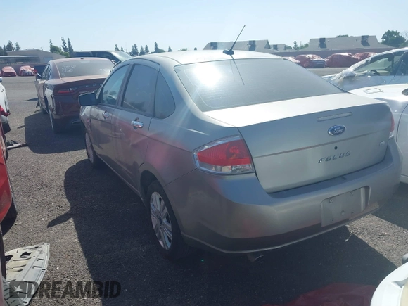 2008 Ford Focus SE with VIN 1FAHP35N88W242103, listed as a IAAI auction lot 39468422 with 169,911 mi miles. Bid and sale history available at carsss.com. Image 3.