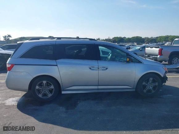 2012 Honda Odyssey Touring with VIN 5FNRL5H90CB066469, listed as a IAAI auction lot 41463009 with NaN miles. Bid and sale history available at carsss.com. Image 14.