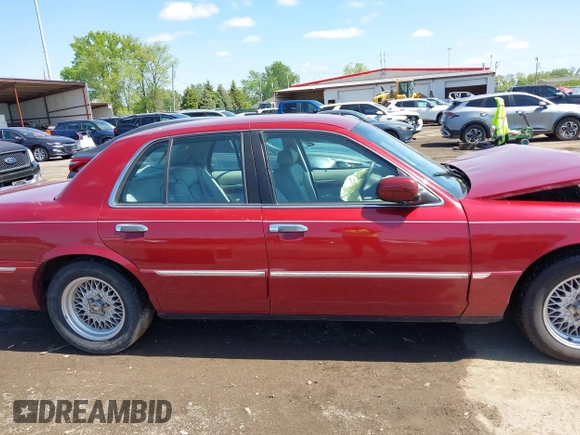 2002 Mercury Grand Marquis LS Premium z VIN 2MEFM75W22X653775, wystawiony jako IAAI lot #42225138 z przebiegiem 124 749 mil mil oraz . Historia ofert i sprzedaży dostępna na DreamBid. Obrazek 13.