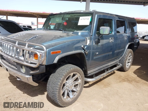 2005 Hummer H2 SUV with VIN 5GRGN23U25H107505, listed as a IAAI auction lot 41703768 with 213,723 mi miles. Bid and sale history available at carsss.com. Image 17.