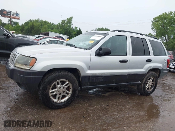 2004 Jeep Grand Cherokee Laredo z VIN 1J4GW48S64C132172, wystawiony jako IAAI lot #42163524 z przebiegiem 170 952 mil mil oraz . Historia ofert i sprzedaży dostępna na DreamBid. Obrazek 14.
