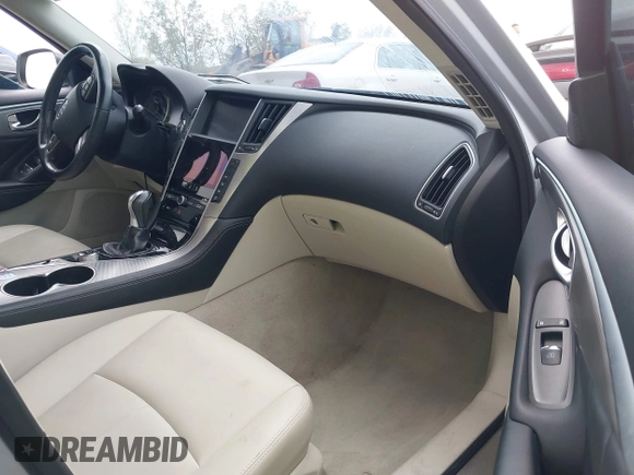 2015 Infiniti Q50 Premium z VIN JN1BV7AR8FM390785, wystawiony jako IAAI lot #42200437 z przebiegiem 94 841 mil mil oraz . Historia ofert i sprzedaży dostępna na DreamBid. Obrazek 5.